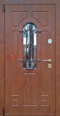 Темная железная дверь со стеклом и ковкой в коричневом цвете ДСК-154 в Лосино-Петровсом