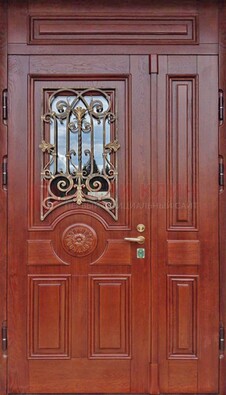 Филенчатая железная дверь со стеклом и ковкой ДСК-204 в Лосино-Петровсом